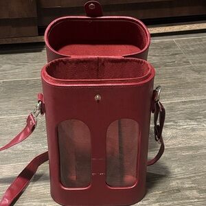 Red leather wine bottle carrier